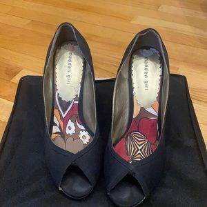 Black peeptoe heels with straw-like bottom heels